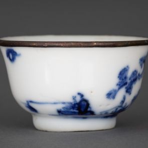 Rice wine cup decorated with a fishing figure and a poem