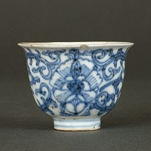 Cup with stylized floral design
