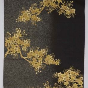 Japanese obi design sample with golden sakura trees in front of black background