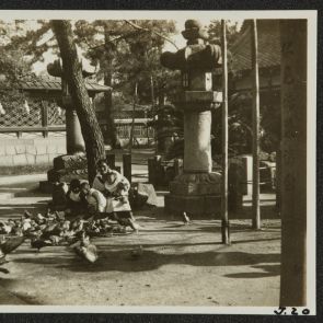 Feeding pigeons in the courtyard of a shrine, Momoyama