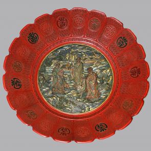 Ornamental plate with shou characters on the petals and three deities in the centre