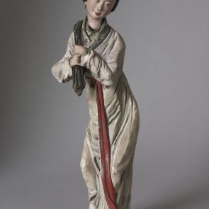 Female figure with a bag