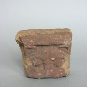 Lion's head. Ledge fragment.