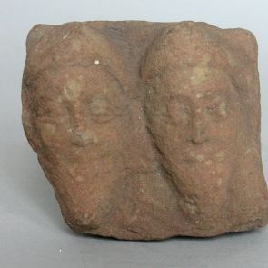Two heads (fragment of a frieze)