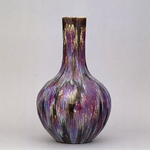 Bottle vase with reddish purple and black flambé glaze